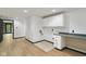 Spacious laundry area with cabinetry, countertop, and easy access to the outdoors at 10455 Courageous Dr, Indianapolis, IN 46236