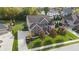 Spacious home with a big yard, a large driveway, and mature trees in a quiet neighborhood at 10599 Geist View Dr, Fishers, IN 46055