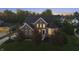 Beautiful home in a quiet neighborhood, with a well-maintained yard and mature trees surrounding the property at 10599 Geist View Dr, Fishers, IN 46055