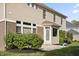 Exterior view showcasing the backyard, patio area, and lush greenery, perfect for outdoor living at 10599 Geist View Dr, Fishers, IN 46055