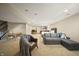 Basement featuring a living area, bedroom, dining area and stairs at 10599 Geist View Dr, Fishers, IN 46055