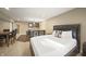 Basement includes an open layout with bar, kitchen, bed and dining table at 10599 Geist View Dr, Fishers, IN 46055