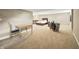 Finished basement with a seating area, bedroom and table at 10599 Geist View Dr, Fishers, IN 46055