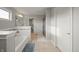 Well-lit bathroom with separate tub, shower and tile flooring at 10599 Geist View Dr, Fishers, IN 46055