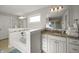 Bathroom featuring granite vanity, tub, and walk-in shower at 10599 Geist View Dr, Fishers, IN 46055