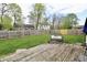Large backyard showcasing a seating area on a wooden deck, ideal for outdoor relaxation and entertaining at 10688 Ashview Dr, Fishers, IN 46038