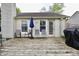 A charming backyard wood deck has multiple seating areas for relaxed enjoyment of the outdoors at 10688 Ashview Dr, Fishers, IN 46038