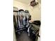 Spacious walk-in closet provides plenty of storage for clothes, shoes, and accessories at 10688 Ashview Dr, Fishers, IN 46038