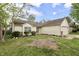 Charming single-story home with a two-car garage, well-maintained lawn, and lovely landscaping at 10688 Ashview Dr, Fishers, IN 46038