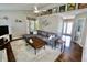 Spacious living room with vaulted ceiling, plush gray sectional sofa, and stylish decor, perfect for relaxation and entertaining at 10688 Ashview Dr, Fishers, IN 46038