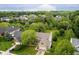 Charming home nestled among mature trees in a tranquil neighborhood setting, providing privacy at 11141 Saybrook Ct, Fishers, IN 46037