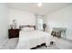 Cozy bedroom featuring neutral tones, comfortable bed, and a stylish vanity area at 11141 Saybrook Ct, Fishers, IN 46037