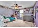 Bright bedroom features a large window and a dresser, offering ample natural light at 11438 Montoya Dr, Zionsville, IN 46077