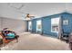 Spacious bonus room with plenty of natural light and comfortable seating at 11438 Montoya Dr, Zionsville, IN 46077