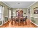 Dining room with hardwood floors and built-in hutch at 11438 Montoya Dr, Zionsville, IN 46077