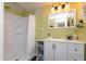 This modern bathroom features an updated vanity and walk-in shower at 116 High St, Brooklyn, IN 46111