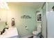 This bathroom features a vanity with a sink, toilet, and walk in shower at 116 High St, Brooklyn, IN 46111