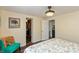 Comfortable bedroom with wood floors, a bed, and a walk-in closet at 116 High St, Brooklyn, IN 46111