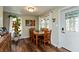 Inviting dining room with ample seating and natural light, perfect for enjoying meals with Gathering and friends at 116 High St, Brooklyn, IN 46111