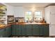 Charming kitchen featuring butcher block counters, stylish cabinets, and modern appliances at 116 High St, Brooklyn, IN 46111