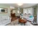 Comfortable living room with an open layout, neutral decor, and plenty of natural light, perfect for Gathering gatherings at 116 High St, Brooklyn, IN 46111