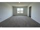 Bedroom with plush carpeting, natural light from the window and neutral walls at 1216 Mcbride St, Greenfield, IN 46140