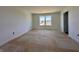 Spacious bedroom with neutral walls, and a door at 1216 Mcbride St, Greenfield, IN 46140