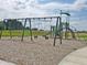 Playground area with swings and slides in a well-maintained community park at 1216 Mcbride St, Greenfield, IN 46140