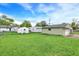 View of the expansive backyard showing the garage and fence at 126 Brunswick Dr, Greenwood, IN 46143