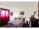 Bedroom featuring decorative bed, matching nightstand and framed artwork at 126 Brunswick Dr, Greenwood, IN 46143