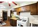 Kitchen showcasing vintage cabinets and a classic gas range at 126 Brunswick Dr, Greenwood, IN 46143