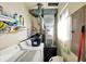 Laundry area featuring washer, dryer, storage shelves and utility sink at 126 Brunswick Dr, Greenwood, IN 46143