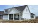 Beautiful home with stone accents, a covered porch, and lovely curb appeal at 14913 Higgins Dr, Westfield, IN 46074