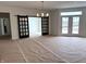 Open living space with sliding barn doors and a view to the outdoor area at 14913 Higgins Dr, Westfield, IN 46074