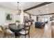 A dining area with a view of the kitchen and access to backyard at 1534 Fletcher Ave, Indianapolis, IN 46203