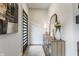 Bright entryway featuring a modern door, stylish console table, and elegant decor at 1534 Fletcher Ave, Indianapolis, IN 46203