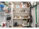 Walk-in pantry with well-organized shelves, offering ample storage space at 1534 Fletcher Ave, Indianapolis, IN 46203