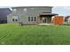 Expansive backyard featuring a pergola and green lawn perfect for outdoor activities and relaxation at 16112 Lavina Ln, Fishers, IN 46040
