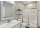 Bright bathroom with a glass-enclosed shower and modern fixtures at 16112 Lavina Ln, Fishers, IN 46040