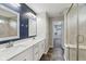Double vanity bathroom with a walk-in shower and tasteful decor at 16112 Lavina Ln, Fishers, IN 46040