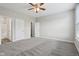 Spacious bedroom with carpet flooring, light-colored walls, and natural light at 16112 Lavina Ln, Fishers, IN 46040