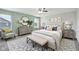 Stylishly decorated bedroom with a large bed, accent wall, and coordinated furniture at 16112 Lavina Ln, Fishers, IN 46040