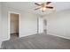 Bright bedroom with a ceiling fan, closet, and natural light. Perfect as is or design it as your own! at 16112 Lavina Ln, Fishers, IN 46040