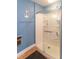 Bathroom featuring a stand up shower with glass doors and a white shower base at 1633 E Thompson Rd, Indianapolis, IN 46227