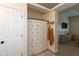 Bathroom offers a shower with gold-dot shower curtain and a storage shelf for towels at 177 Tracy Ridge Blvd, Whiteland, IN 46184