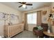 Cozy Bedroom includes bassinet, rocking chair and fun decor at 177 Tracy Ridge Blvd, Whiteland, IN 46184