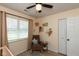 Bright bedroom with a bassinet, rocking chair, and neutral decor at 177 Tracy Ridge Blvd, Whiteland, IN 46184