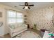 Bedroom shows a sofa-bed, polka-dot wallpaper, ABC rug, and ' ball pit at 177 Tracy Ridge Blvd, Whiteland, IN 46184