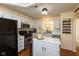 Stylish kitchen featuring white cabinets, stainless steel appliances, and a functional island at 177 Tracy Ridge Blvd, Whiteland, IN 46184