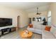Spacious living room with vaulted ceilings, a comfortable sofa, and a stylish decor at 177 Tracy Ridge Blvd, Whiteland, IN 46184